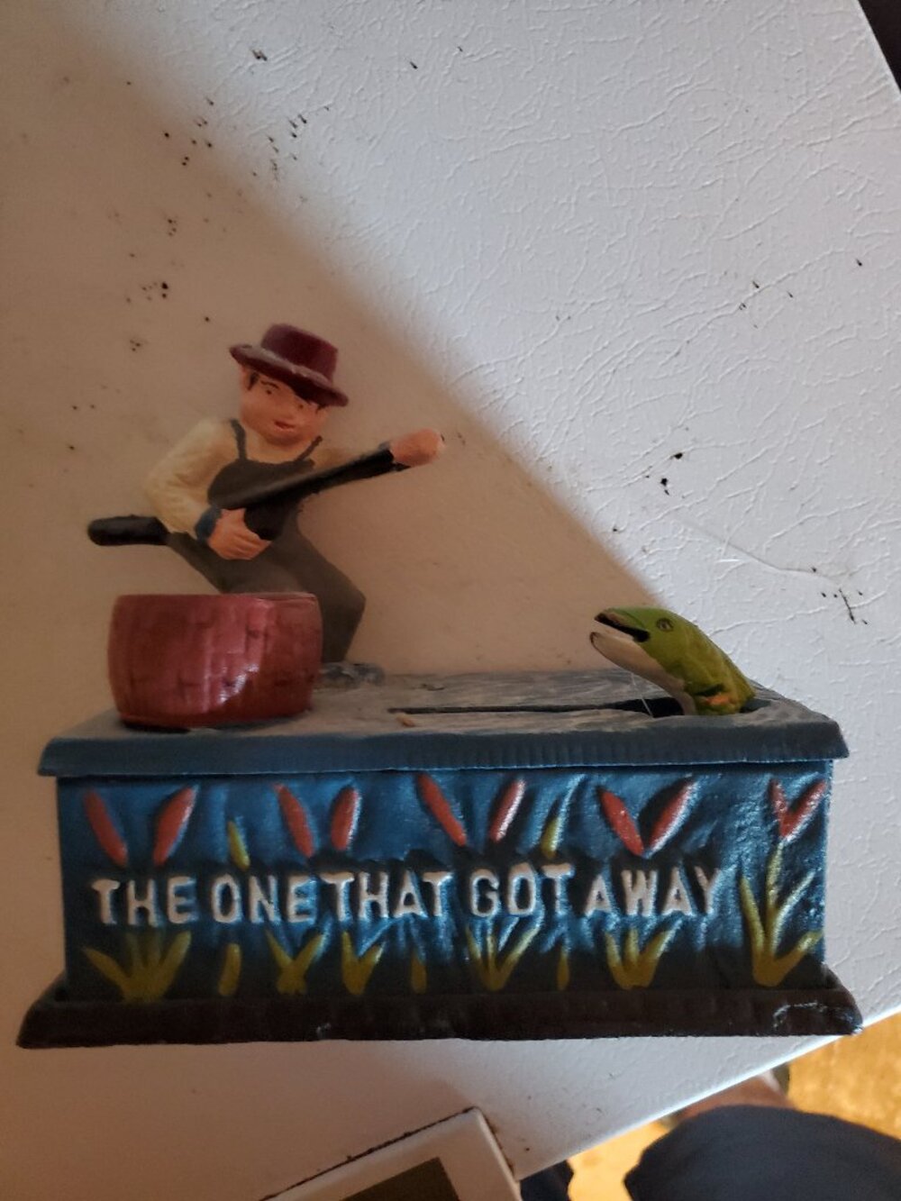 Vintage Fisherman Cast Iron Coin Bank